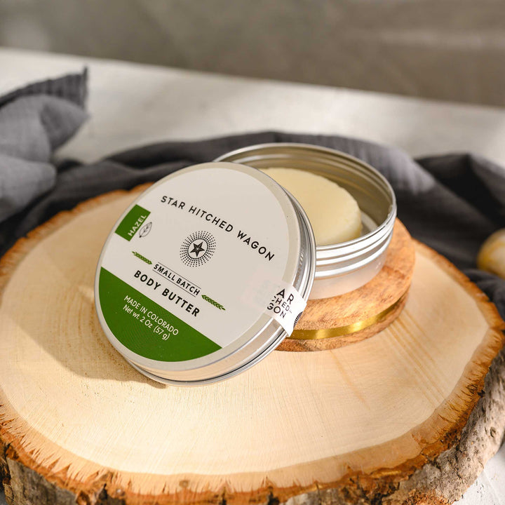 Hazel body butter moisturizer in reusable tin, handcrafted with organic oils and butters to nourish and protect dry skin.