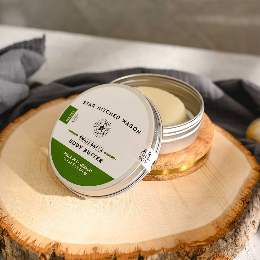 Hazel body butter moisturizer in reusable tin, handcrafted with organic oils and butters to nourish and protect dry skin.