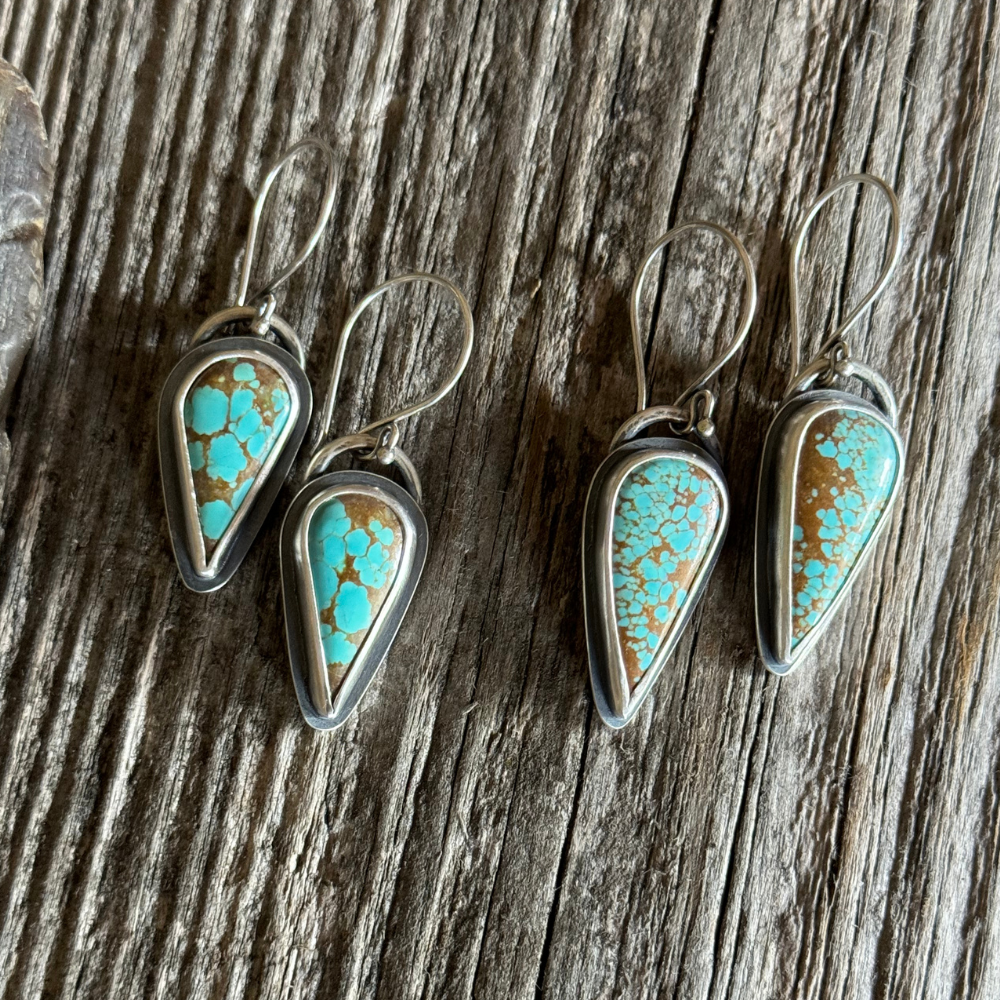 Wayfinder Sterling Silver Turquoise Drop Earring Duo on rustic wood background.